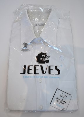 Lot 238 - LORO PIANA; a white cotton long sleeve shirt,...