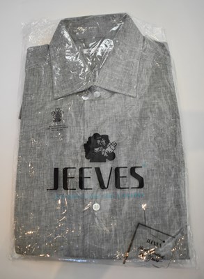 Lot 246 - LORO PIANA; a grey linen long sleeve shirt,...