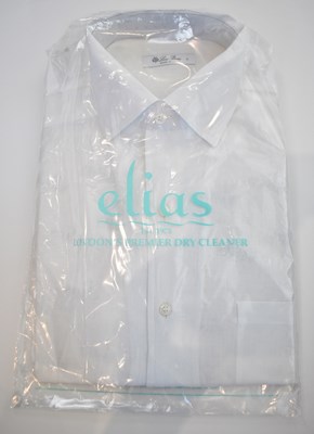 Lot 248 - LORO PIANA; a white linen long sleeve shirt,...