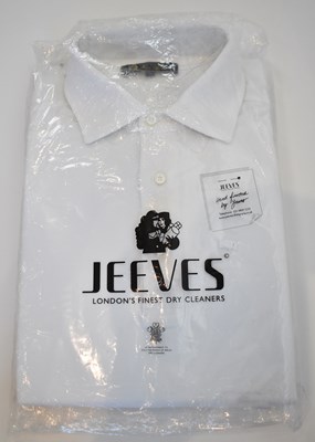 Lot 257 - LORO PIANA; a white cotton long sleeve shirt,...