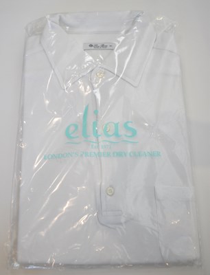 Lot 258 - LORO PIANA; a white cotton long sleeve polo...