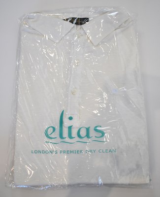 Lot 261 - LORO PIANA; a white linen short sleeve polo...