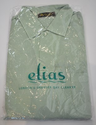 Lot 266 - LORO PIANA; a light green cotton short sleeve...