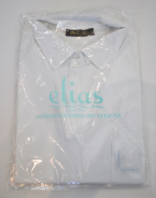 Lot 267 - LORO PIANA; a white cotton short sleeve polo...