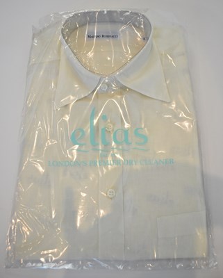 Lot 297 - MARIANO RUBINACCI; a cream cotton long sleeve...