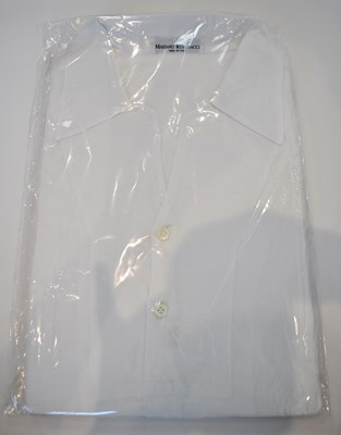 Lot 299 - MARIANO RUBINACCI; a white cotton short sleeve...