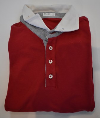 Lot 331 - BRUNELLO CUCINELLI; a red cotton long sleeve...