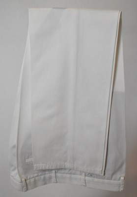 Lot 344 - LORO PIANA; a pair of white cotton trousers,...