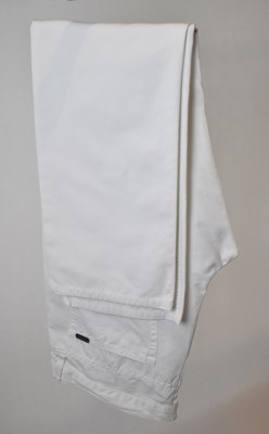 Lot 346 - LORO PIANA; a pair of white cotton jeans, size...