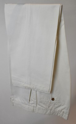 Lot 348 - LORO PIANA; a pair of white cotton trousers,...