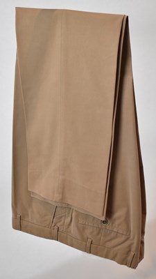 Lot 355 - LORO PIANA; a pair of brown cotton trousers,...