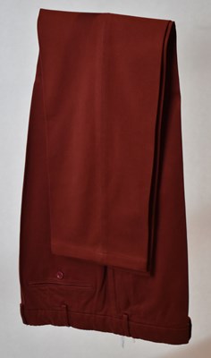 Lot 358 - LORO PIANA; a pair of red cotton trousers,...