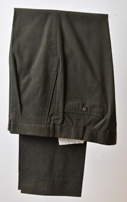 Lot 370 - LORO PIANA; a pair of brown cotton trousers,...