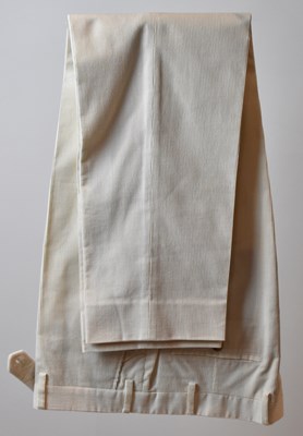 Lot 371 - LORO PIANA; a pair of cream cotton corduroy...