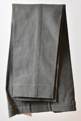 Lot 381 - LORO PIANA; a pair of brown cotton trousers,...