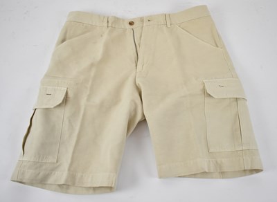 Lot 402 - LORO PIANA; a pair of beige cotton shorts,...