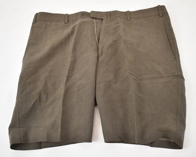 Lot 409 - BERNARD ZINS; a pair of brown cotton shorts,...