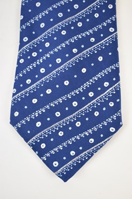 Lot 450 - HERMES; a 100% silk blue tie with geometric...