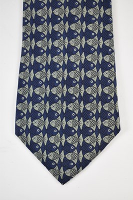 Lot 451 - HERMES; a 100% silk blue tie with fish design.