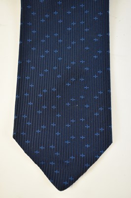 Lot 453 - HERMES; a 100% silk blue tie with cross design.