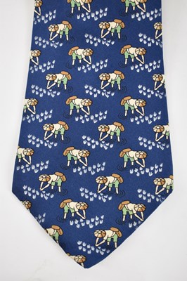 Lot 454 - HERMES; a 100% silk blue tie with cotton...