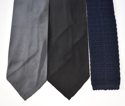 Lot 465 - HERMES; a navy blue knitted tie and two LH...