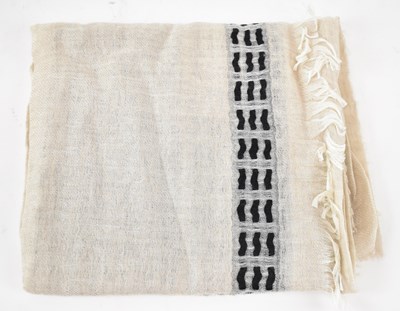 Lot 488 - BEGG & CO; a cream 100% cashmere scarf with...