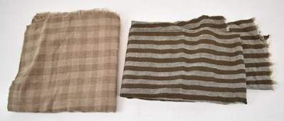 Lot 494 - Two beige 100% cashmere scarves with fringing.