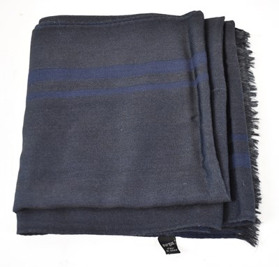 Lot 496 - A navy blue silk and wool mix scarf with...