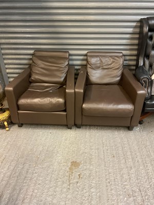 Lot 99 - HABITAT; a pair of brown leather arm chairs.