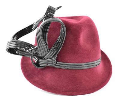 Lot 511 - PHILIP TREACY; a small maroon trilby hat with...