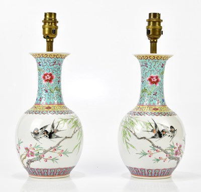 Lot 1146 - A pair of modern Chinese vases, decorated with...