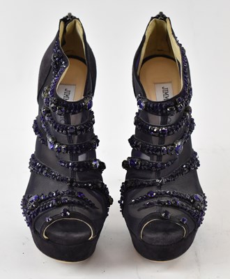 Lot 525 - JIMMY CHOO; a pair of purple suede platform...