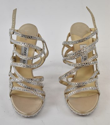 Lot 526 - JIMMY CHOO; a pair of gold satin and diamante...