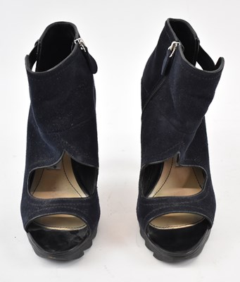 Lot 529 - CAMILLA SKOVGARD; a pair of navy blue suede...