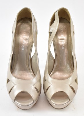 Lot 532 - ELIE SAAB; a pair of gold leather platform...