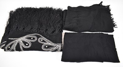 Lot 537 - Three black 100% cashmere scarves, one...