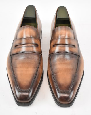 Lot 549 - BERLUTI; a pair a brown leather shoes, size 10.