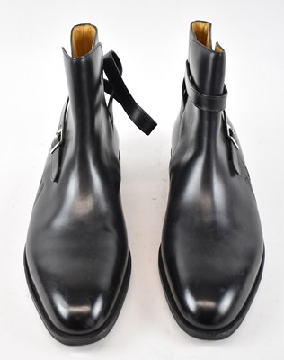 Lot 551 - JOHN LOBB; a pair of black leather ankle boots,...