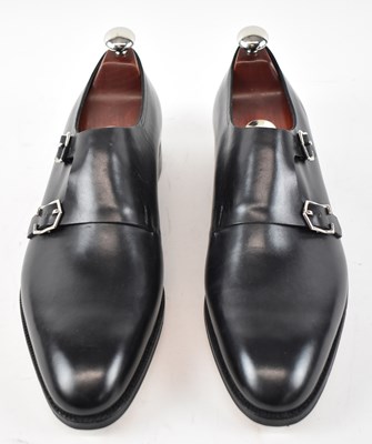 Lot 562 - JOHN LOBB; a pair of black leather shoes, size...