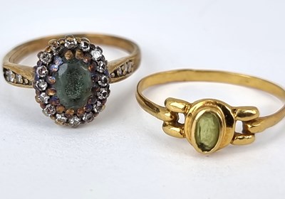 Lot 1076 - Two gold dress rings