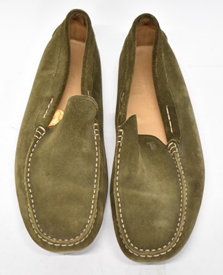 Lot 583 - TODS; a pair of boxed green suede loafers,...