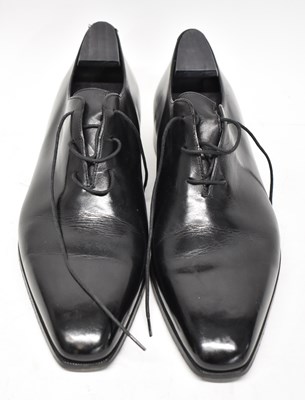 Lot 596 - BERLUTI; a pair of black leather shoes, size 10.