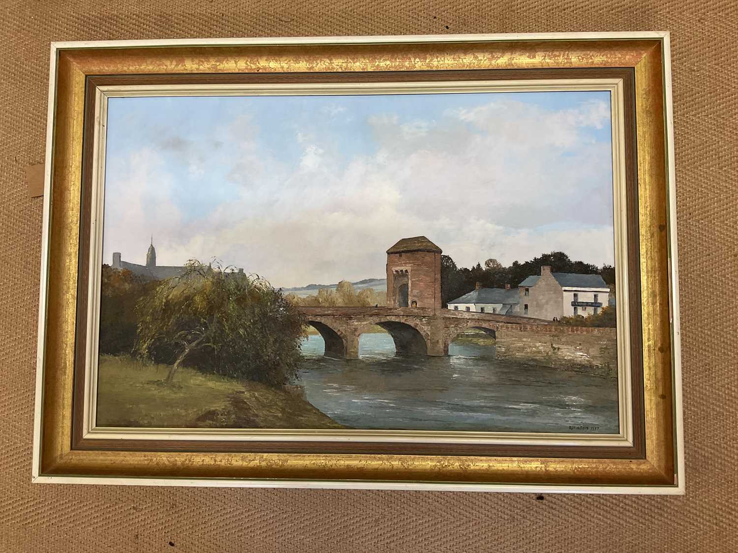 Lot 354 - E J WILSON; oil on board, Monnow Bridge,...