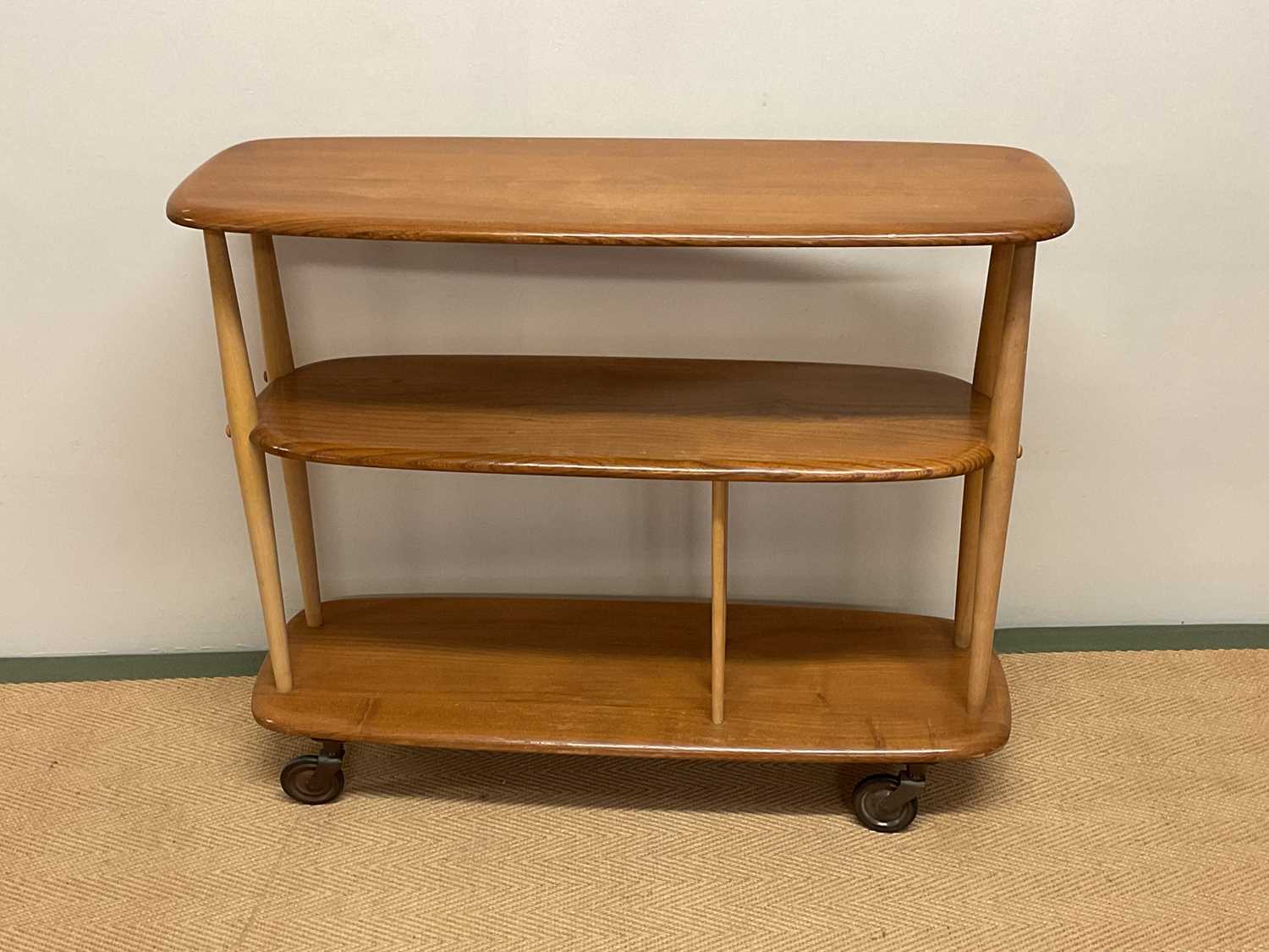 Lot 672 - ERCOL; a model 361 half giraffe trolley room...