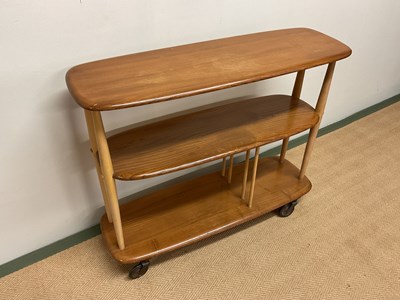 Lot 672 - ERCOL; a model 361 half giraffe trolley room...