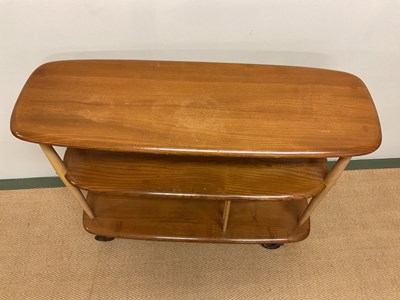 Lot 672 - ERCOL; a model 361 half giraffe trolley room...