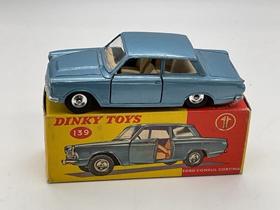 Lot 74 - DINKY;  a boxed Ford Consul Cortina, metallic...