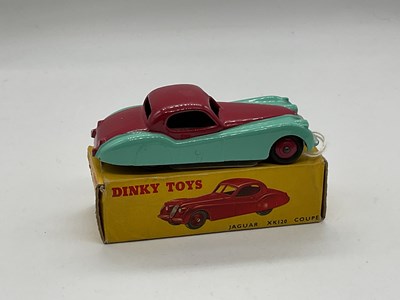 Lot 89 - DINKY; a boxed Jaguar XK120, red/green, 157.