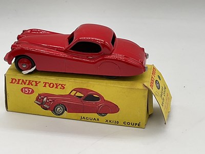 Lot 75 - DINKY; a boxed Jaguar 157, red.